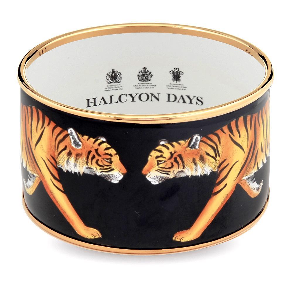 Women's black enamel cuff featuring illustrated tigers and the Halcyon Days logo inside