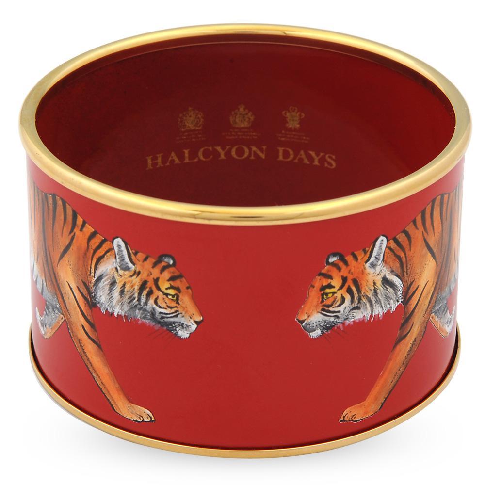 Red enamel cuff with tiger illustrations and Halcyon Days logo